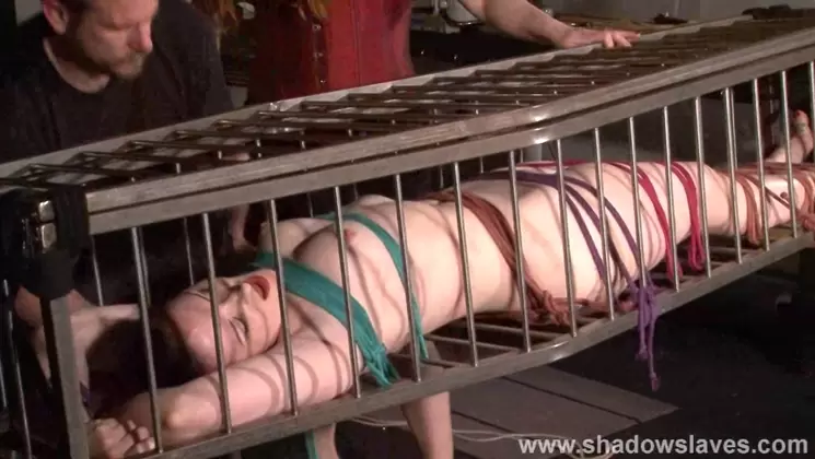 American goddess Carolina Pierce caged and spanked