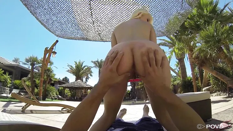 Petite blonde pornstar Darcie Belle takes a cumshot after a wild outdoor POV blowjob