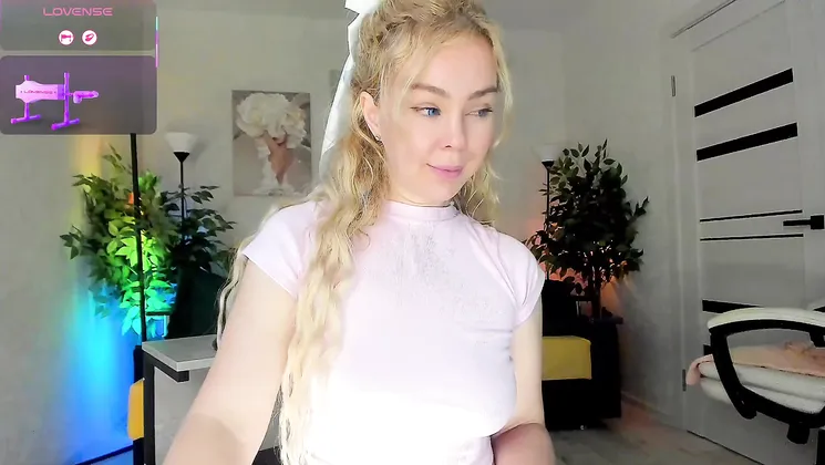A Blonde Teen Masturbates With a Dildo on Webcam
